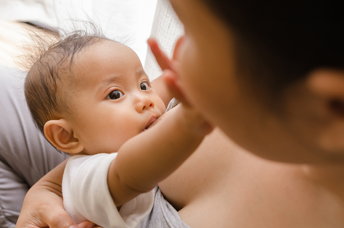 Mother,Breastfeeding,Her,Newborn,Baby,Beside,Window.,Milk,From,Mom??s