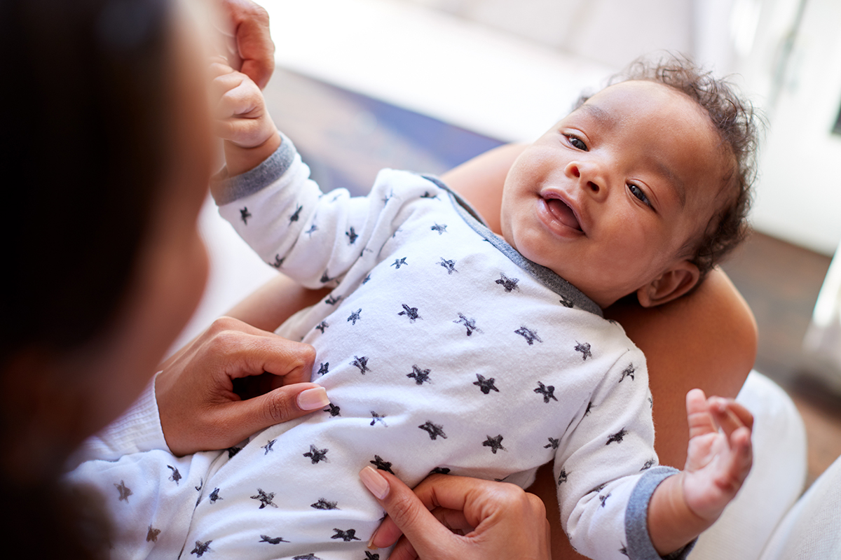Happy,Three,Month,Old,African,American,Baby,Boy,Lying,On
